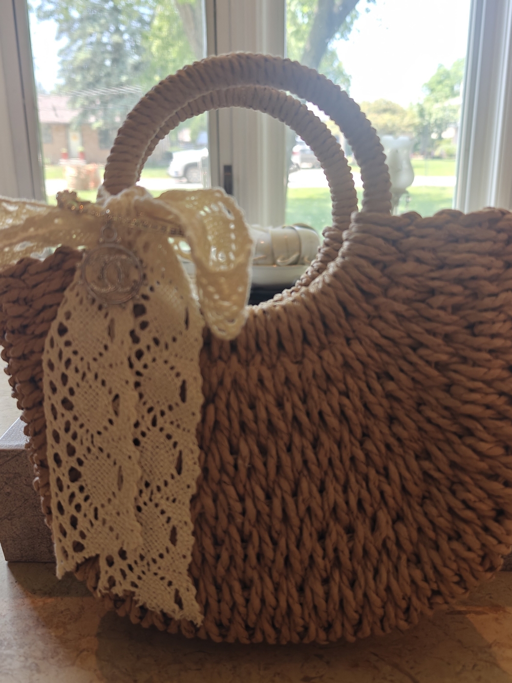 Woven Straw Circle Handle Tote with Lace Bow And CC Charm Brooch